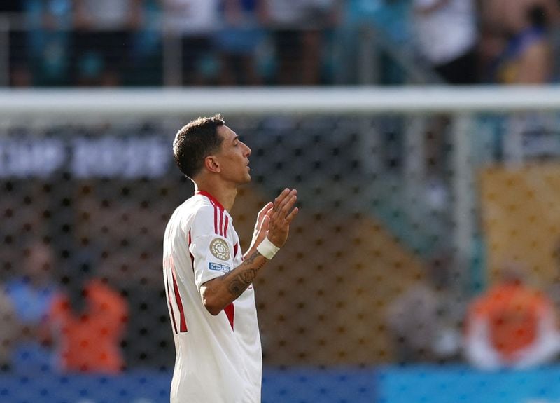 Di María celebrates a goal against Boca Juniors
