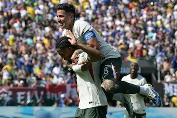 Enzo Fernández celebrates with Joao