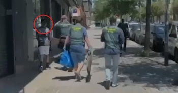 Christian Lupiáñez escorted by