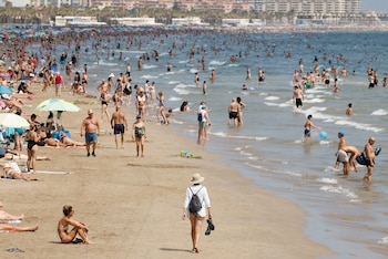 Numerous bathers on the beach