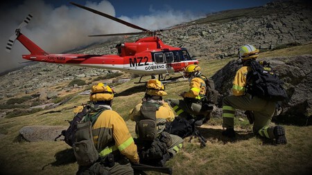 Firefighters battling wildfires in Spain