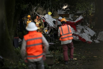 Firefighters work in the area