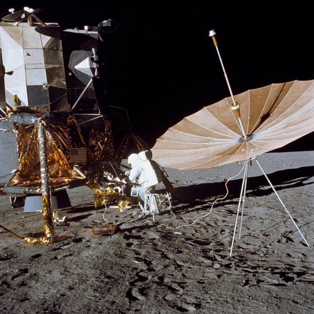 Pete Conrad alongside a deployed S-band antenna during Apollo 12
