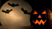 Imagen simbólica de Halloween TV: calabaza de Halloween tallada con murciélagos