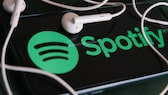 Se acerca la suscripción Spotify Platinum HiFi, logotipo de Spotify con auriculares