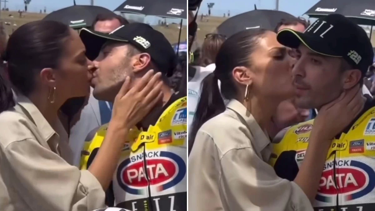 Elodie, el amor con Andrea Iannone sale a la pista: el beso en la parrilla de salida