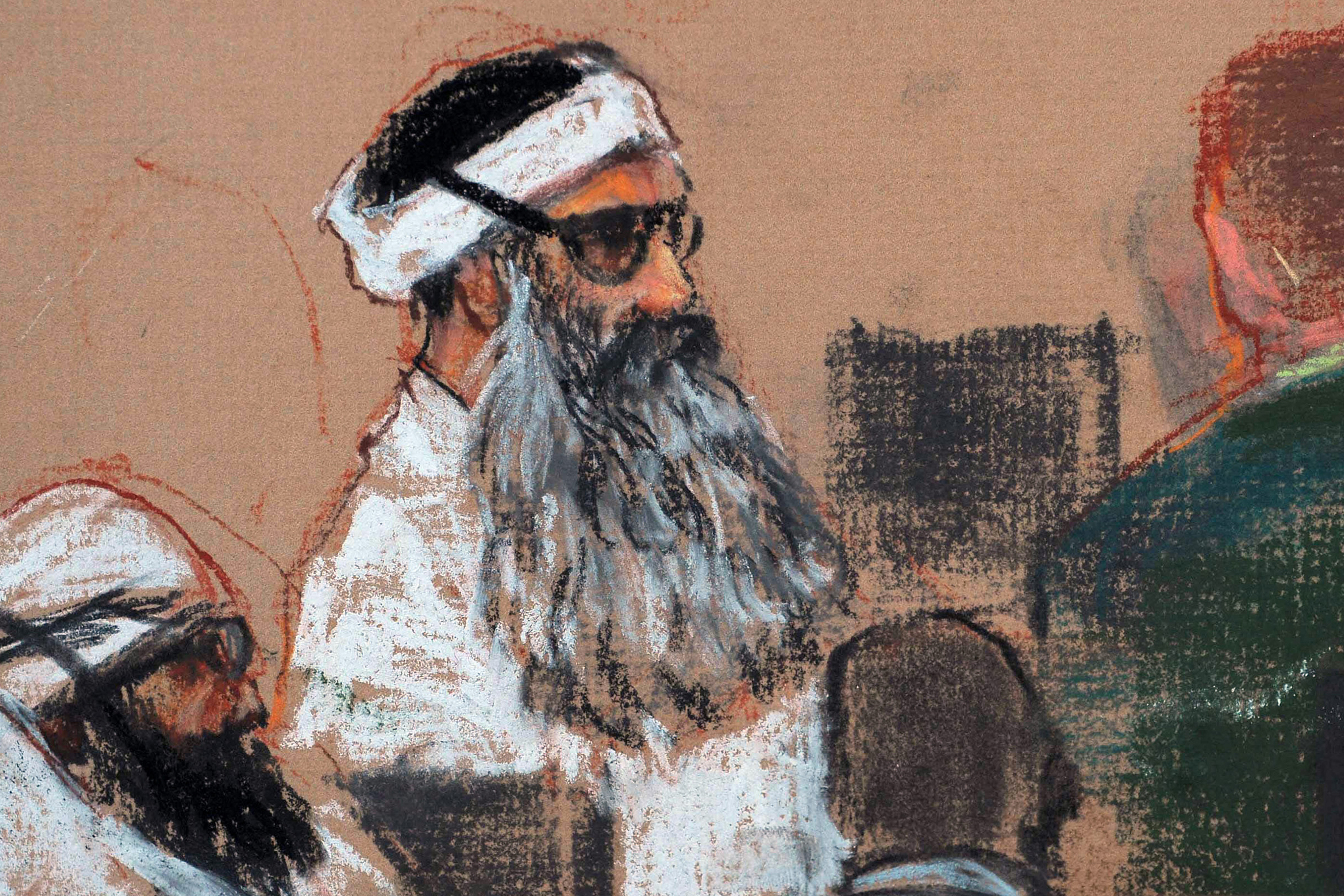 Mohammed y su coacusado Walid Bin Attash, a la izquierda, asisten a una sesión previa al juicio en la Bahía de Guantánamo