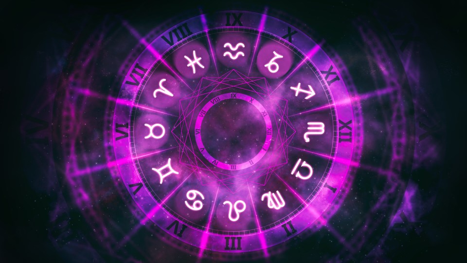 un círculo morado con los signos del zodiaco