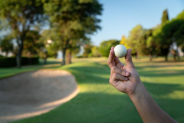 Hombres de golf holandés y club de campo