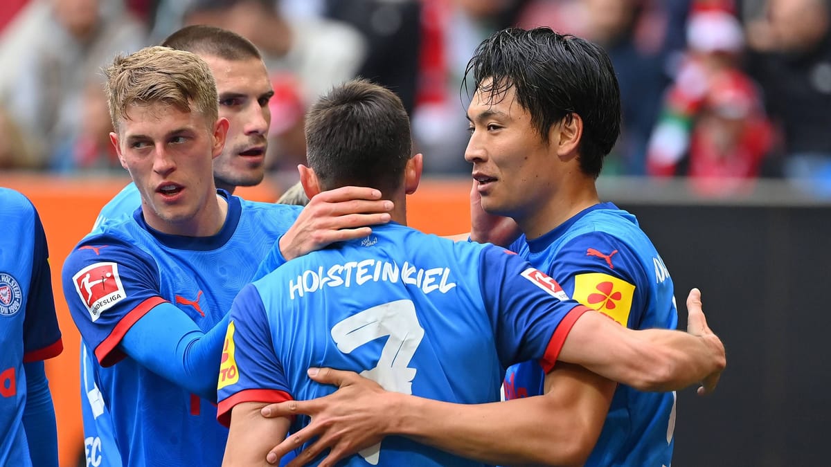 Bundesliga: Kiel gana en Augsburgo y espera en la batalla
