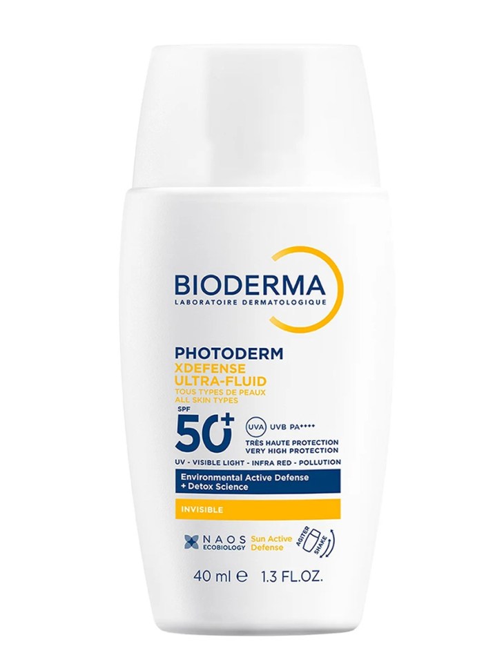 Bioderma Photoderm xDefensa Ultra-fluido SPF 50+ botella de protector solar.
