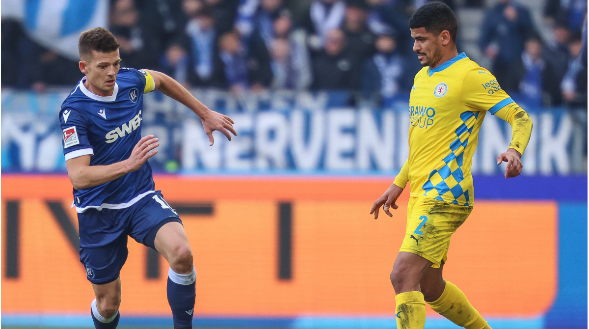 Eintracht Braunschweig Strokes Ivanov y Dräger del escuadrón para el