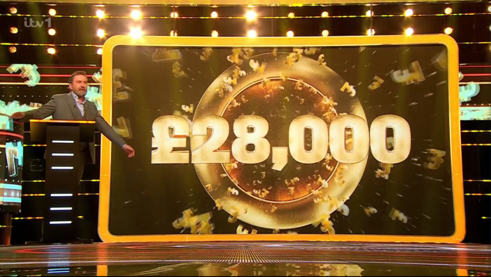 Captura de pantalla de un programa de juegos que revela un premio de £ 28,000.
