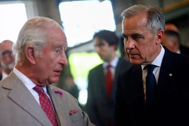 Charles y Mark Carney