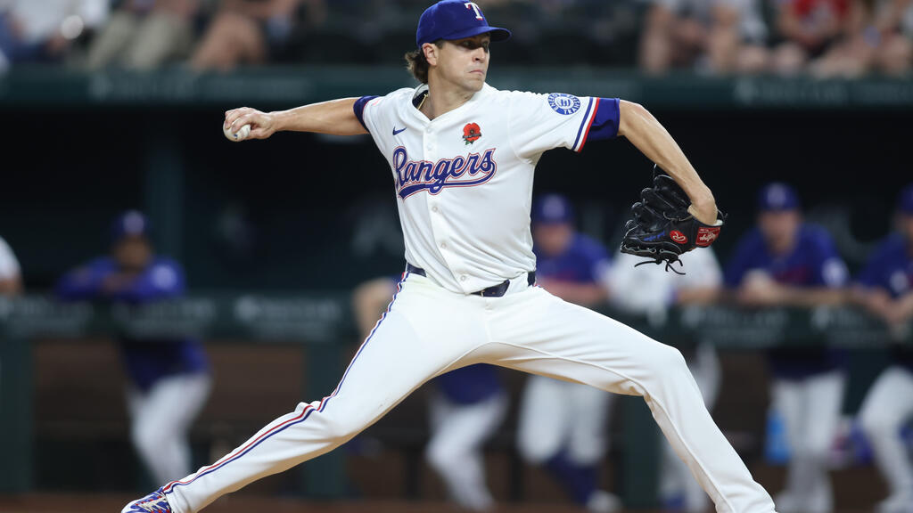 Serie loca de Rangers-Pitcher Torn