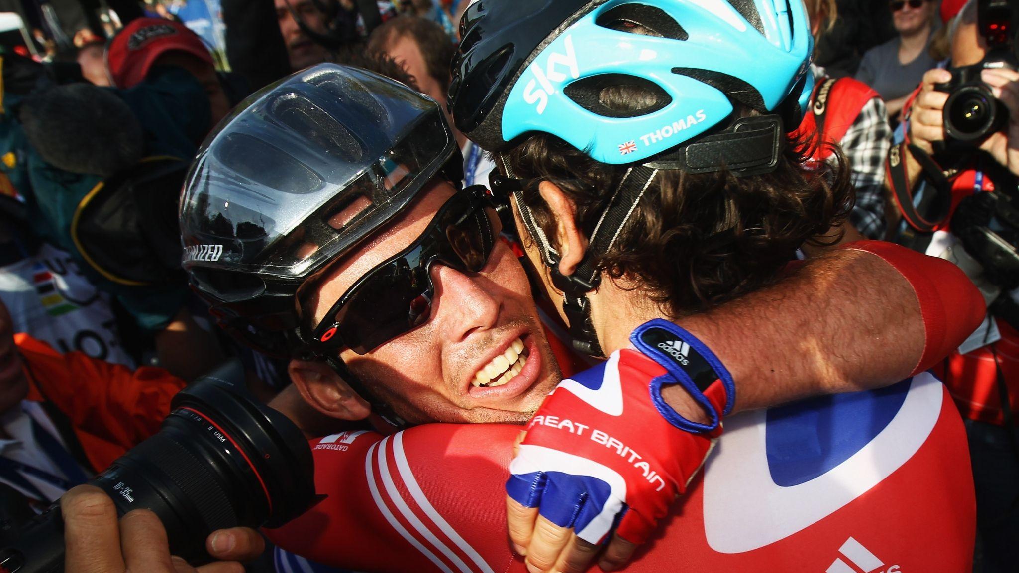 Mark Cavendish is hugged by Geraint Thomas after winning the World Championship Road Race in 2011