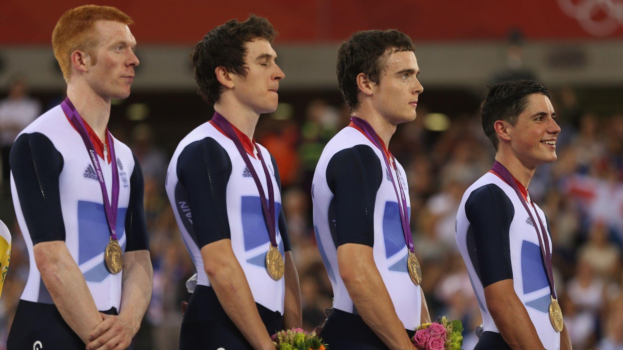 Edward Clancy, Geraint Thomas, Steven Burke and Peter Kennaugh of Great Britain with their gold medals during the medal ceremony for the Men's Team Pursuit Track Cycling at the London 2012 Olympic Games