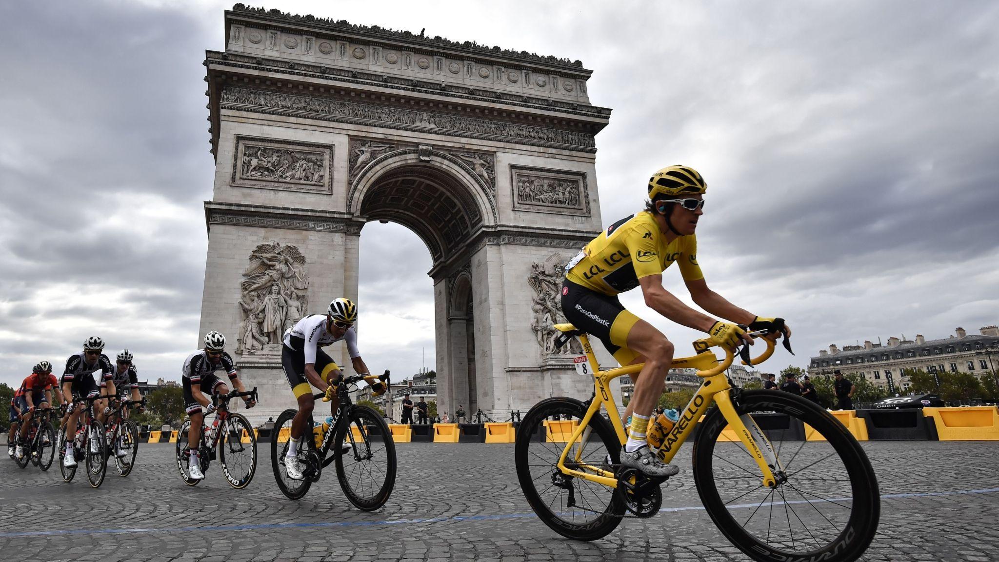 Geraint Thomas rides past the Arc de Triomphe on his way to completing victory in the 2018 Tour de France