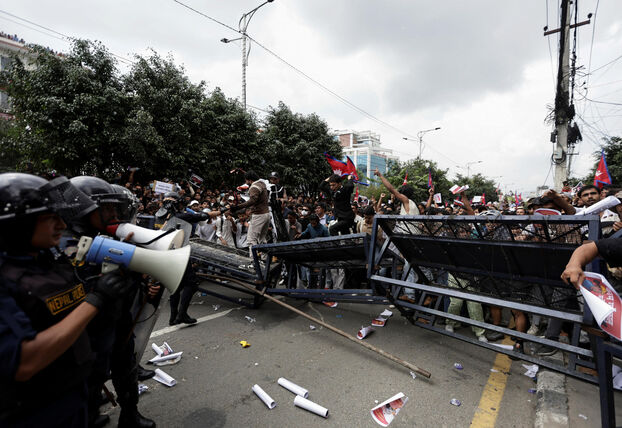 Demonstrators try to break through police barricades during a protest against corruption and the government's decision to block several social media platforms, in Kathmandu, Nepal, September 8, 2025. REUTERS/Navesh Chitrakar