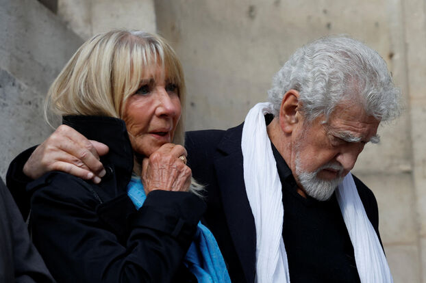 L'acteur Patrick Préjean et sa femme Viviane, très émus au terme de la cérémonie. Reuters. 
