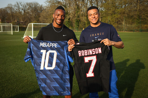 Kylian Mbappé y Bijan Robinson