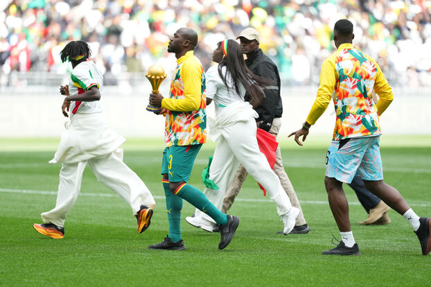 CAN: las imágenes de los senegaleses y su trofeo en