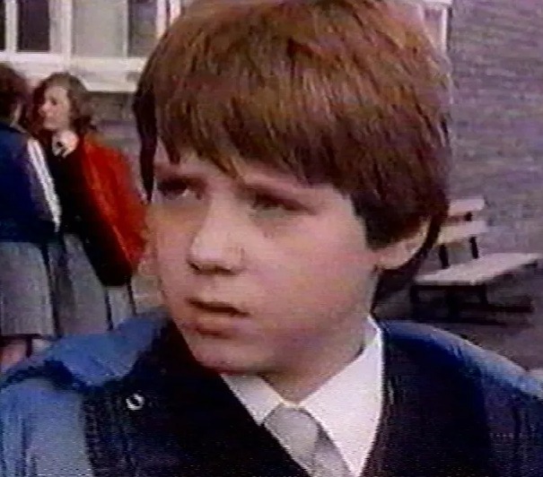 Un fichier photo de l'acteur John Alford pendant son passage dans le programme télévisé Grange Hill.