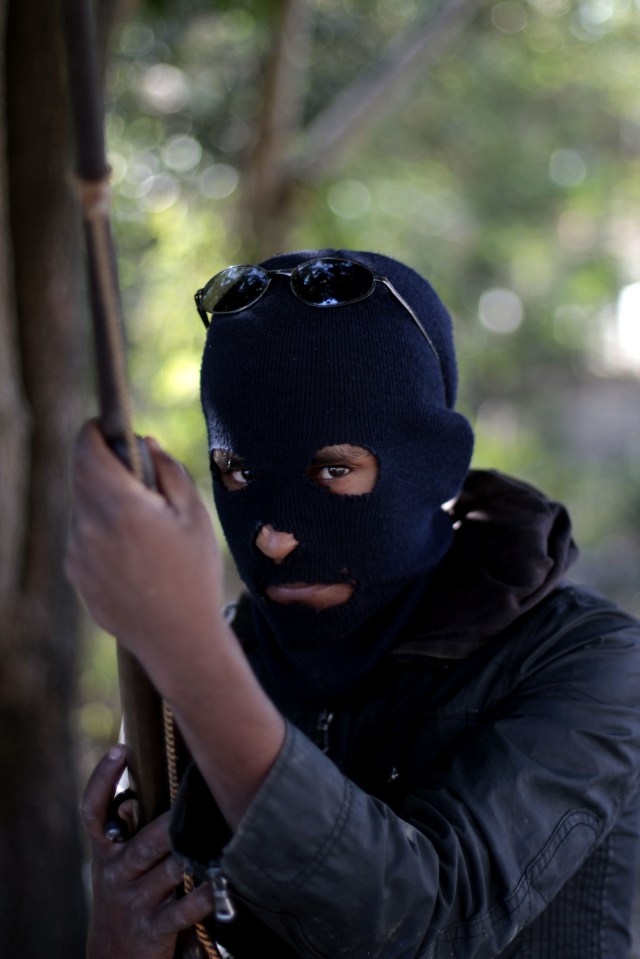 Un habitant cagoulé de Tecoanapa, dans l'État de Guerrero, au sud du Mexique, en 2013.