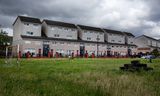 Des enfants jouent au football à Dennistoun, un quartier résidentiel pauvre de l'est de Glasgow.   