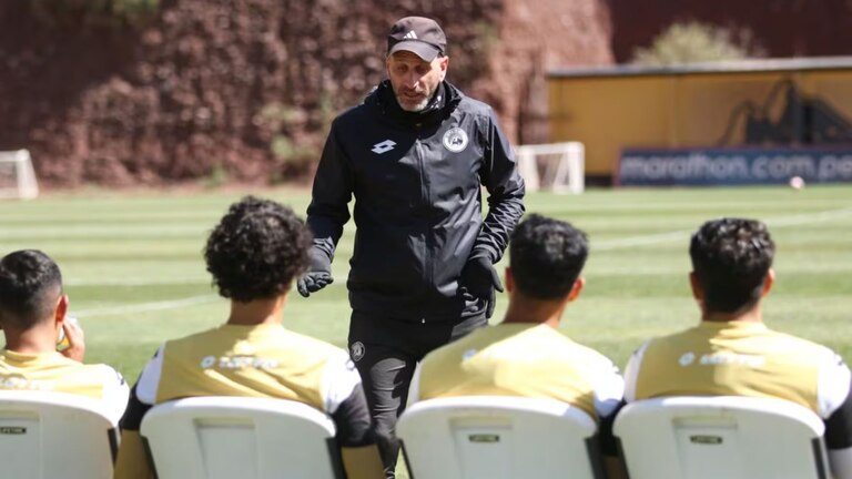 Rondelli avec ses joueurs