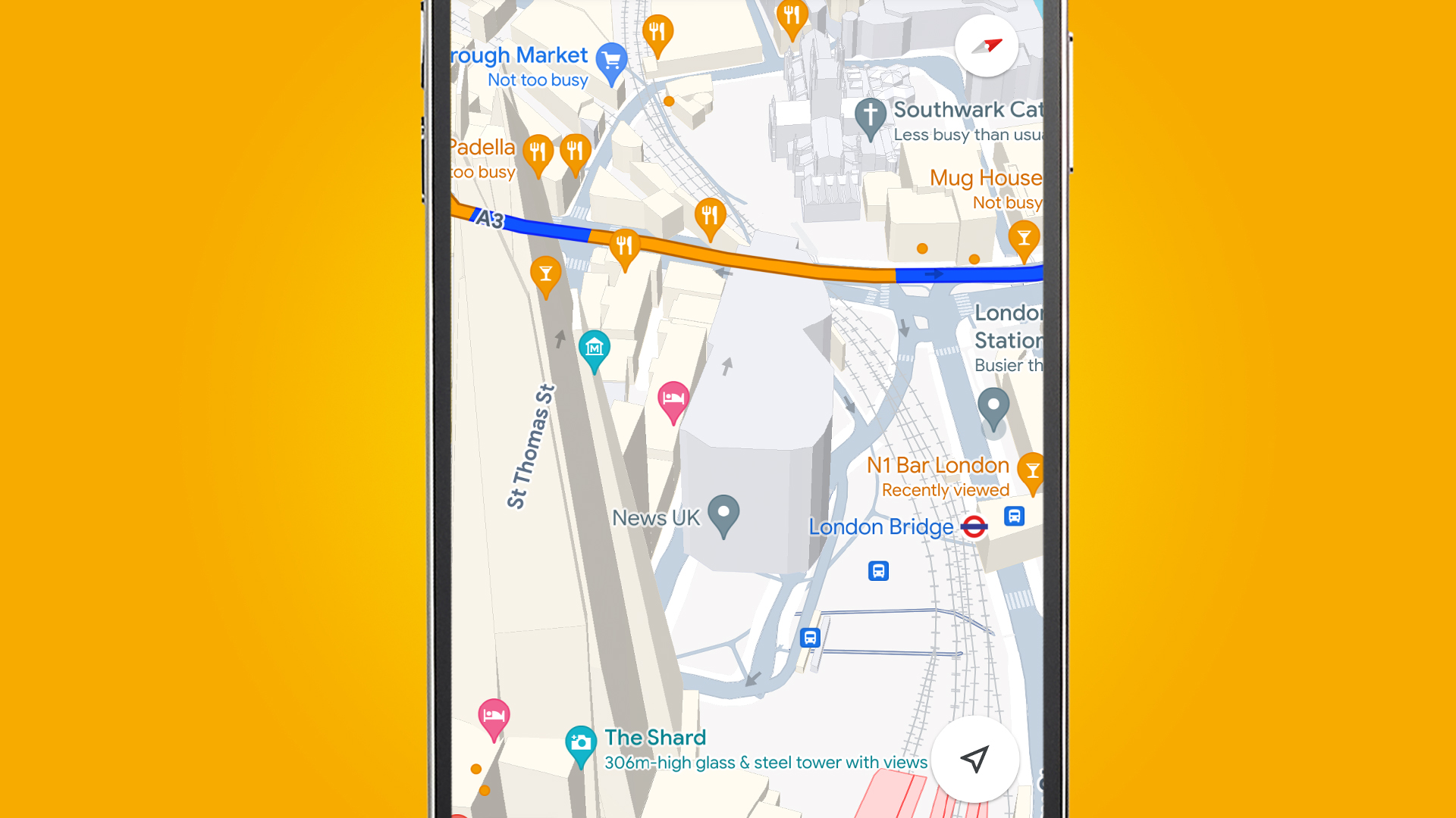 Google Haritalar uygulamasındaki 3D binaları gösteren turuncu arka planlı bir telefon