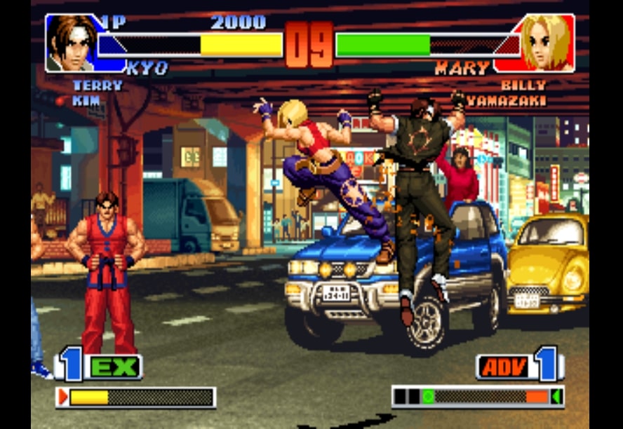 Kyo, King of Fighters '98'de Mary ile dövüşüyor