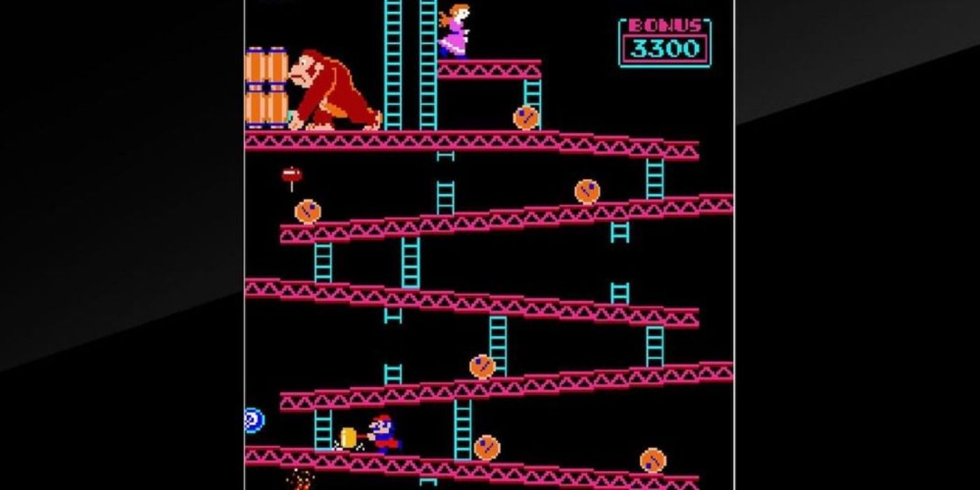 Mario'nun varillerin üzerinden atladığı Donkey Kong video oyununun bir görüntüsü.