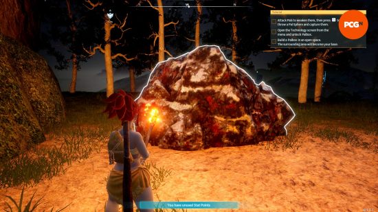 Bir oyuncu, birçok Palworld kaynağının arasında büyük bir kayanın içinde duruyor.