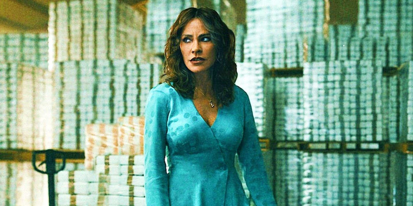 Griselda mini dizisinde mavi elbise giyen ve ürün raflarının önünde duran Griselda Blanco rolünde Sofia Vergara