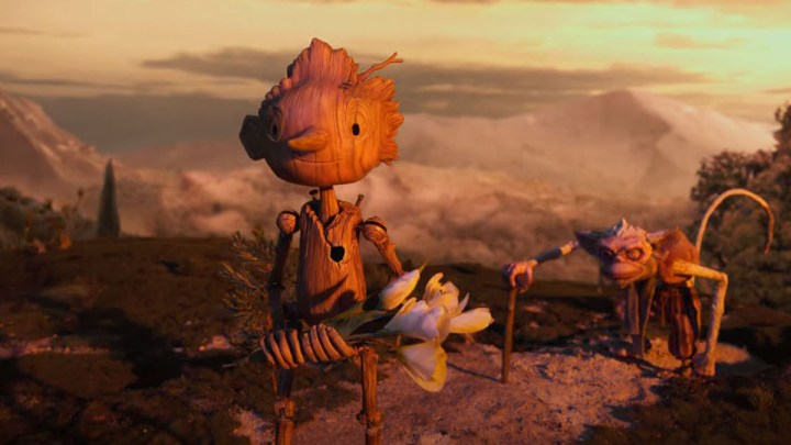 Guillermo del Toro'nun Pinokyo'sunda çiçek tutan Pinokyo.