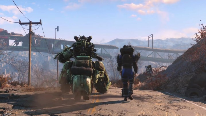 Fallout 4'te çorak arazide yürüyen bir adam ve bir robot.