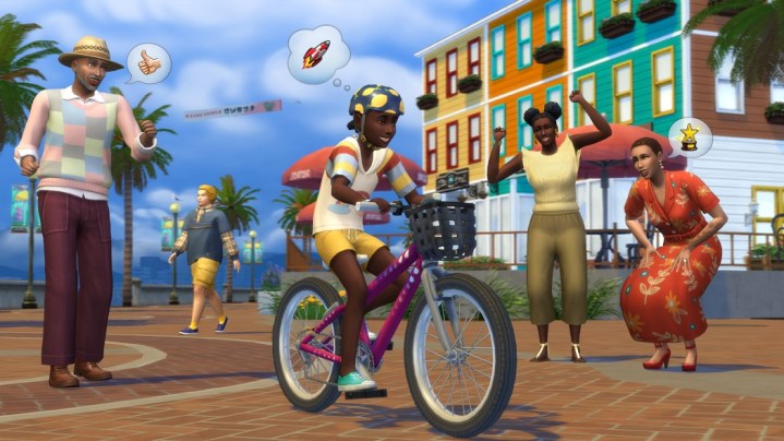 Çocuk Sim bisiklete binerken diğer Simler onları neşelendiriyor.