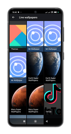 Xiaomi telefonu, Dünya ve Mars Süper Duvar Kağıtları dahil canlı duvar kağıdı seçeneklerini gösterir.