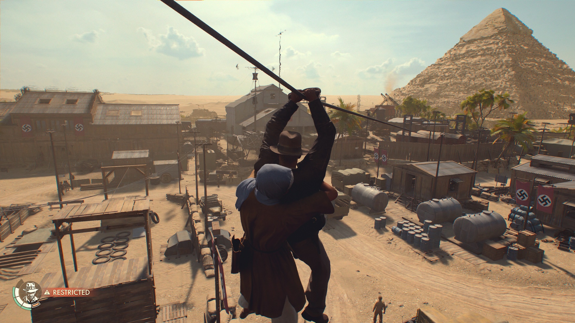 Indy ve bir arkadaşı Indiana Jones ve Great Circle'da ipten aşağı kayıyor