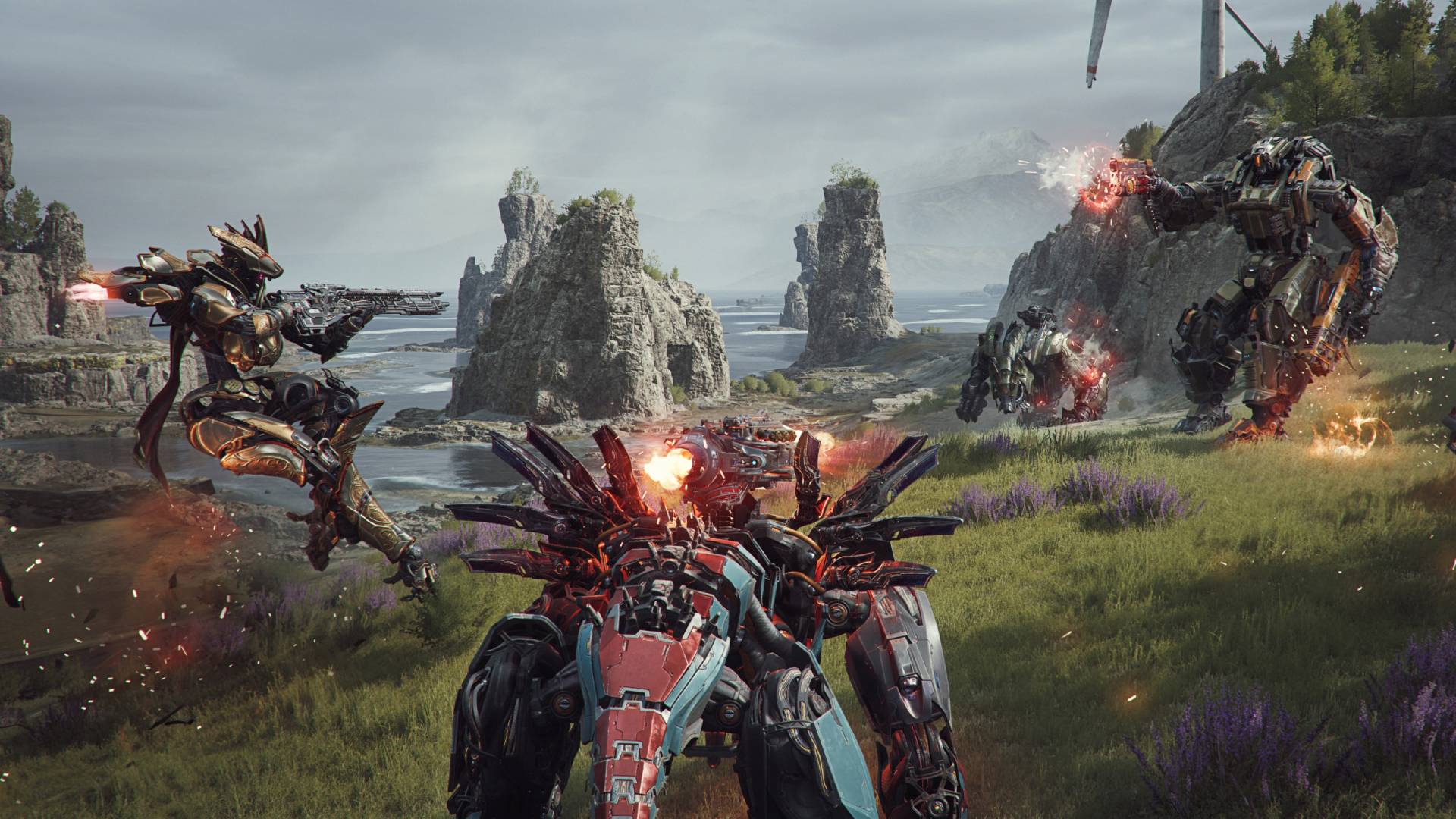 çelik avcıları-tankların dünyası-devs-mech-battle-royale-oyunu Arkalarında kayalıklar ve deniz bulunan bir çayırlık alanda savaşan dev robotların görüntüsü