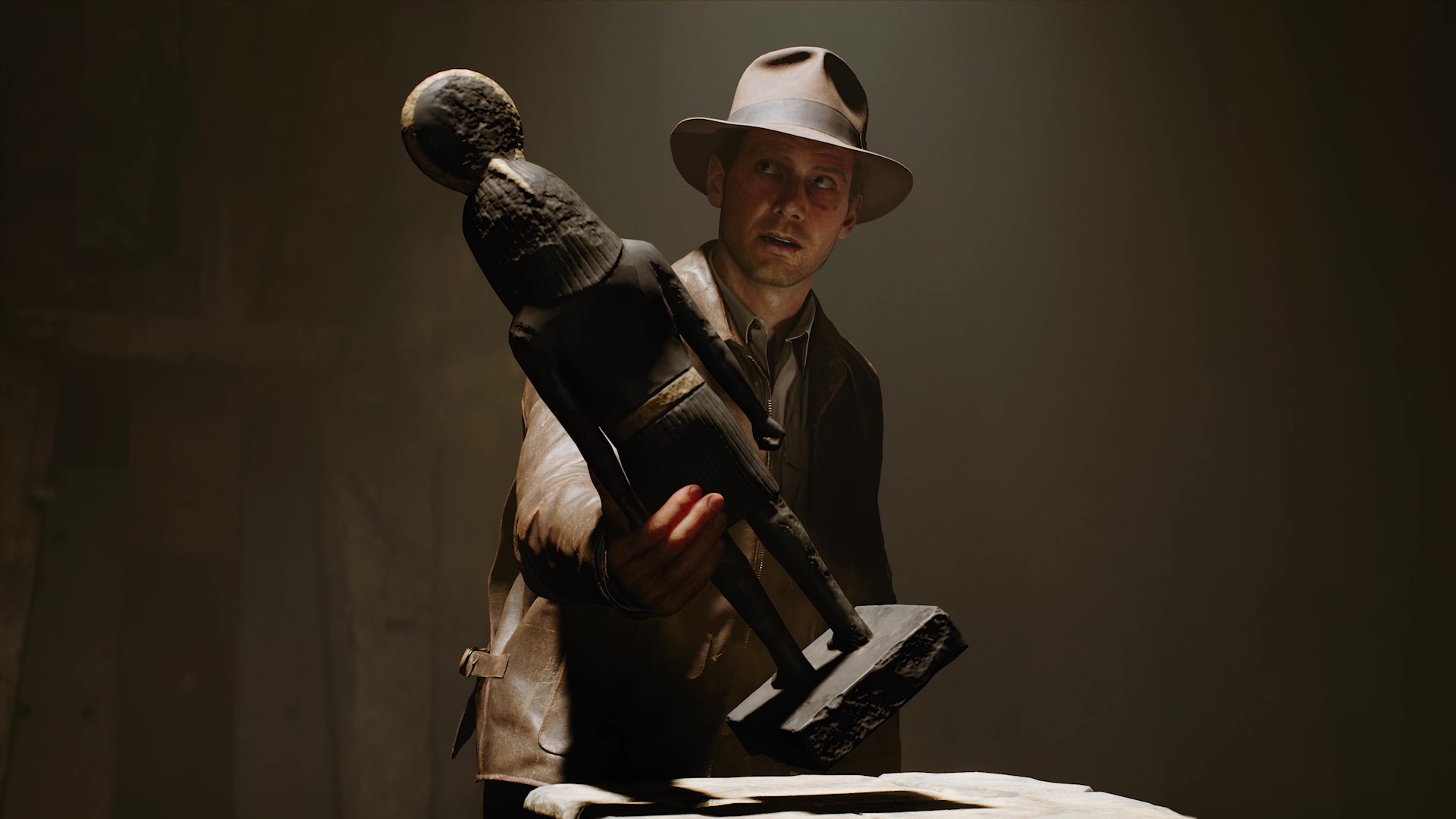 Indiana Jones ve Great Circle derin dalış fragmanının, Indiana Jones'un eski bir eser bulmasını gösteren ekran görüntüsü