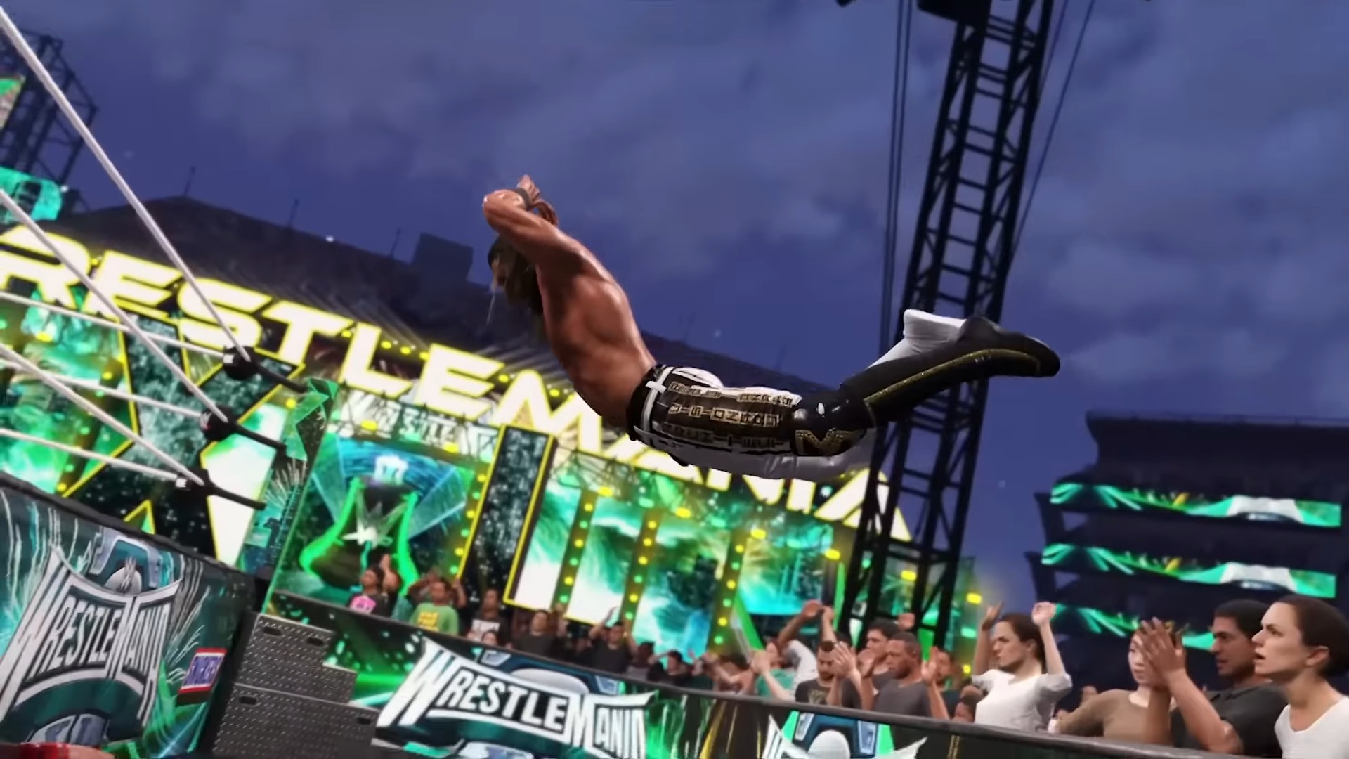 Seth Rollins WWE 2K25'te bir barikattan atlıyor