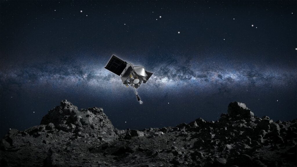 Bir sanatçının Osiris-Rex'in Bennu'ya kazılması hakkındaki izlenimi.