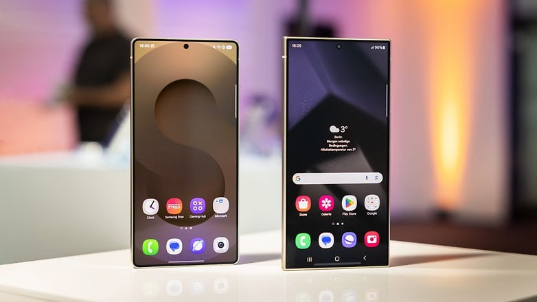 İki Samsung Galaxy S25 akıllı telefon, canlı arka planlara sahip bir masada sunulmuştur.