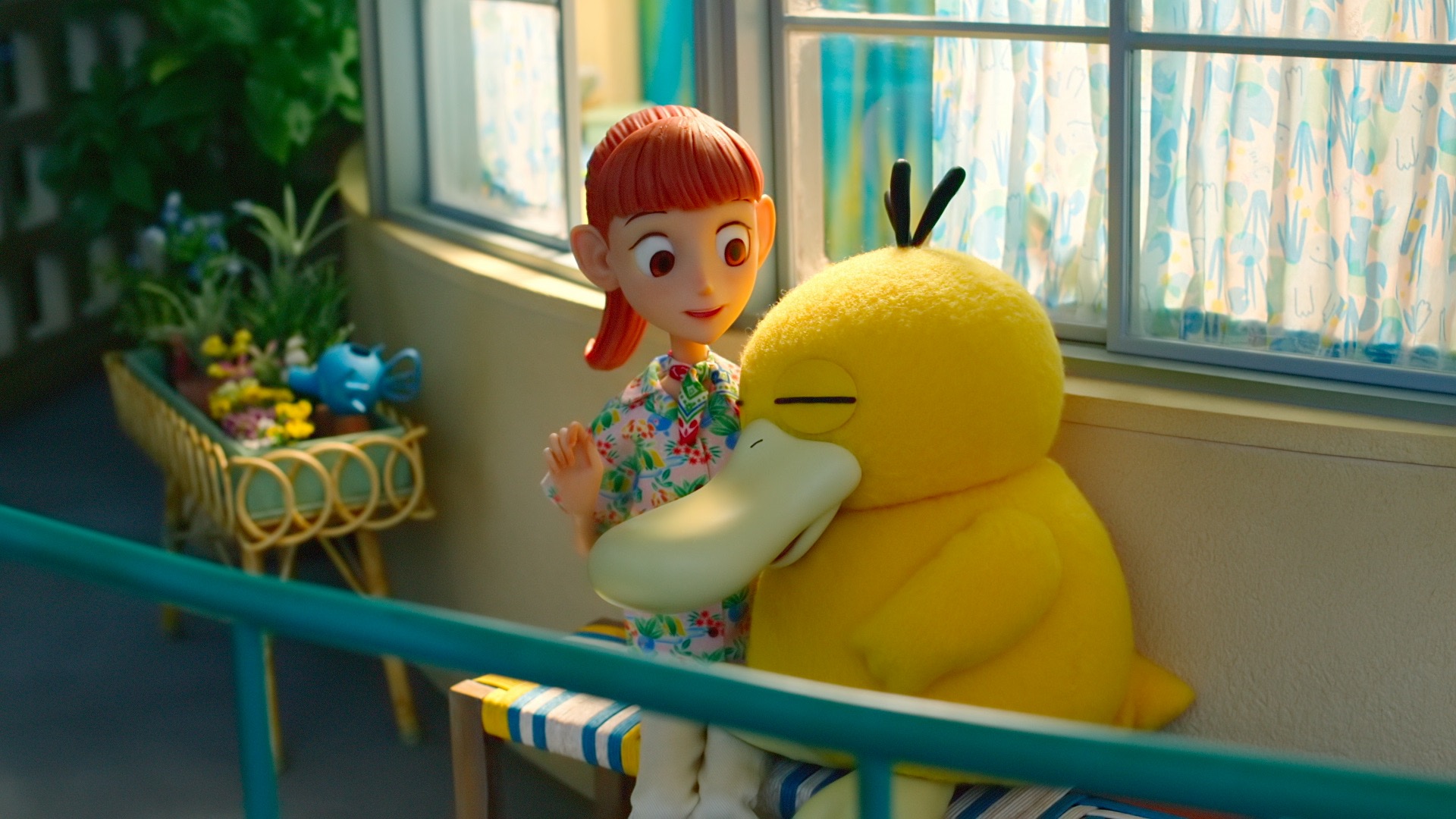 Psyduck, Netflix'ten bir sahnede Haru'ya snuggling yapıyor "Pokémon Concierge"