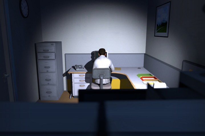 Bilgisayarlarında oturan bir ofis çalışanı