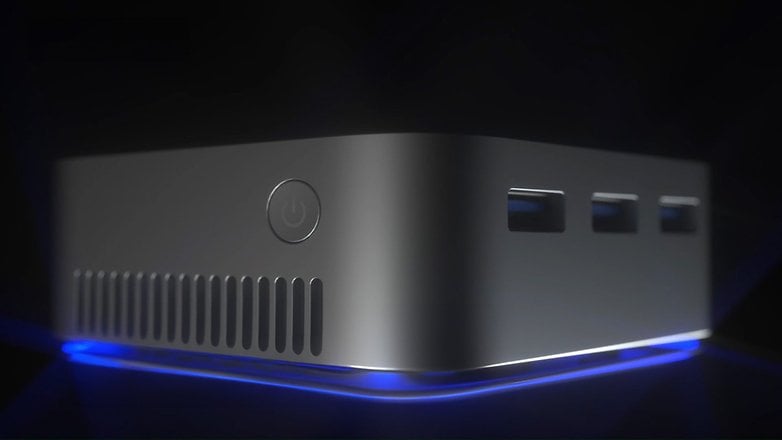 Blue Light ile aydınlatılan bir açma/kapama anahtarı ve birkaç bağlantıya sahip zarif bir BlackView M80 mini-PC.